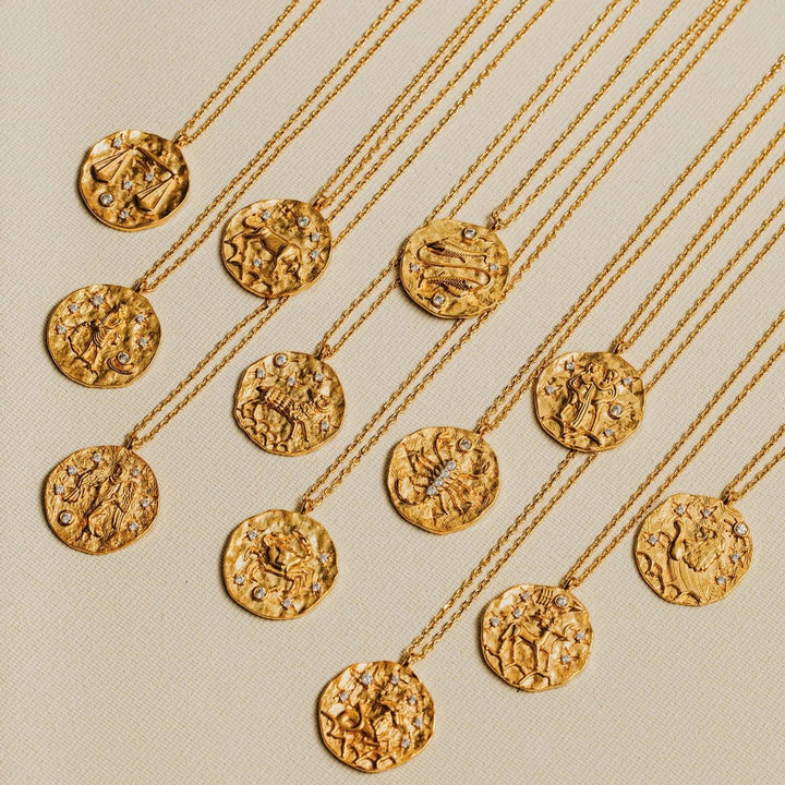 Capricorn Zodiac Necklace Pale Gold | Accessories | Smuk - Dameklær på nett